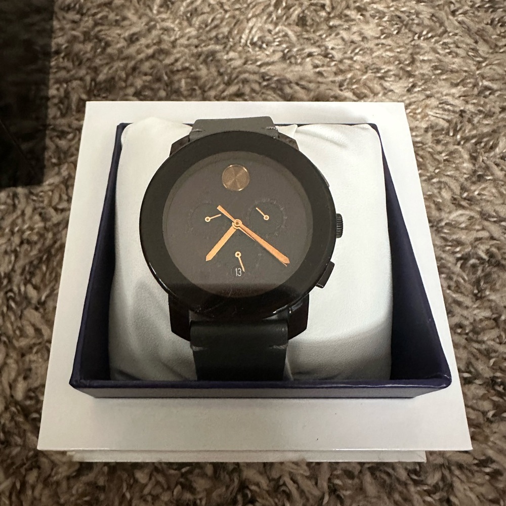 Movado Black and Gold Watch Sleek Design